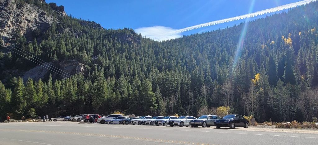Line of cars on a club driving tour event