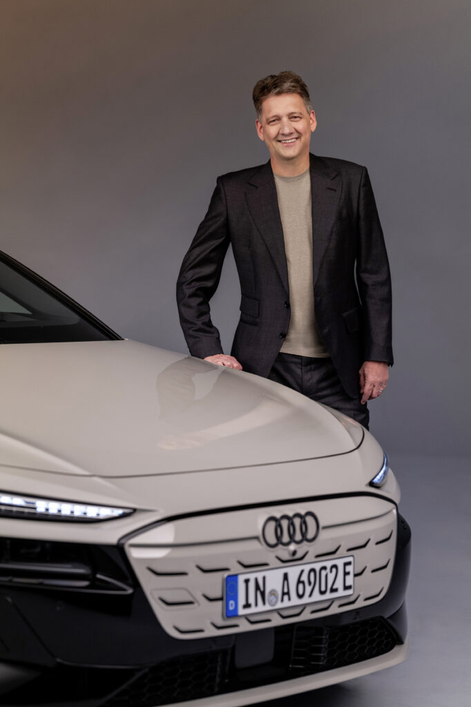 Gernot Döllner, CEO of AUDI AG, beside the new A6 Sportback e t